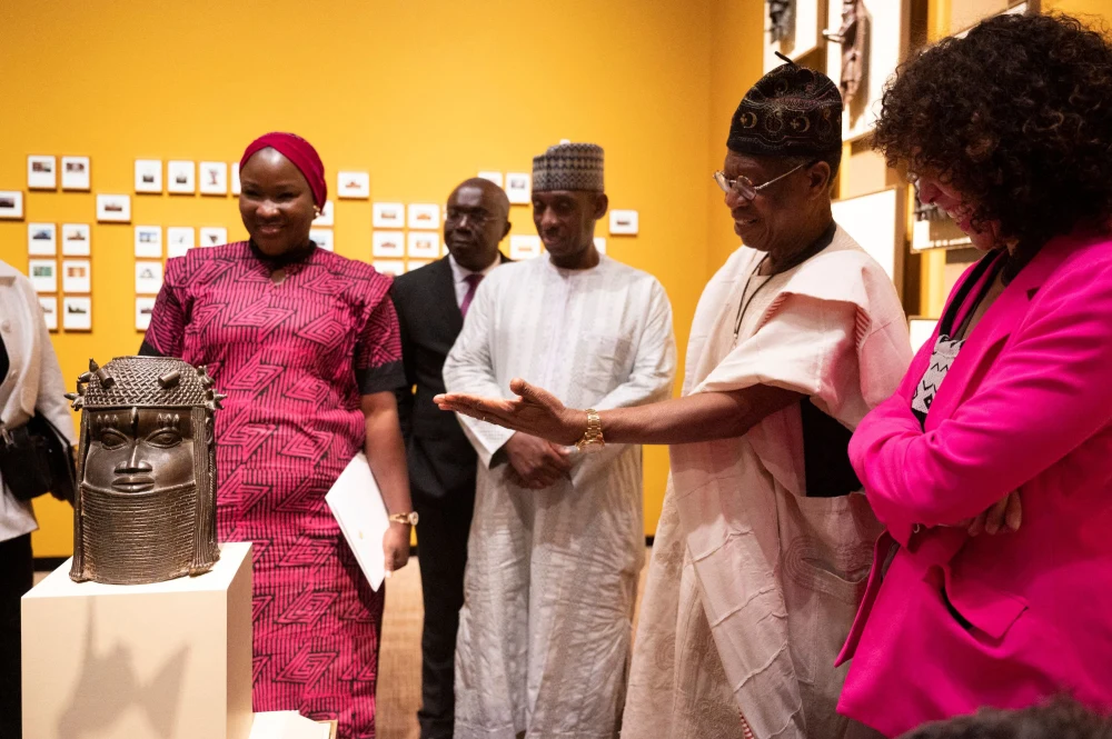 Lai Mohammed, Nigeria’s previous Minister of Information and Culture pictured at the repatriation ceremony of Nigeria’s commemorative “Royal Oba Head” Benin Bronze hosted at the Smithsonian National Museum of African Art (NBC News, “U.S. museums return African bronzes stolen in the 19th century”)
