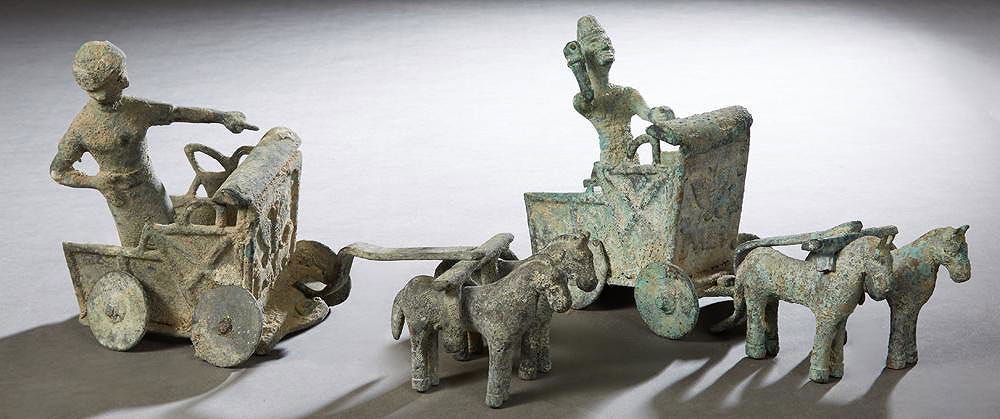 Two Ancient Roman Patinated Bronze Horse Drawn Chariots. 4 solid wheeled chariot.