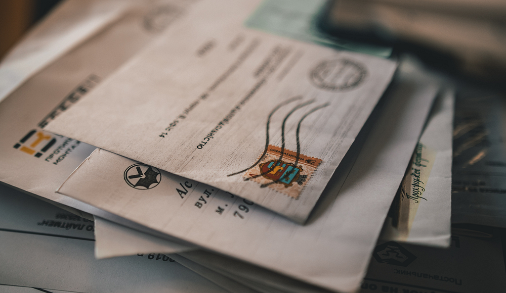 Paper envelopes on top of each other.