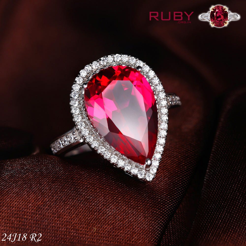 Stylish ruby pear shape ring. Worn this iconic piece of pear shape ...