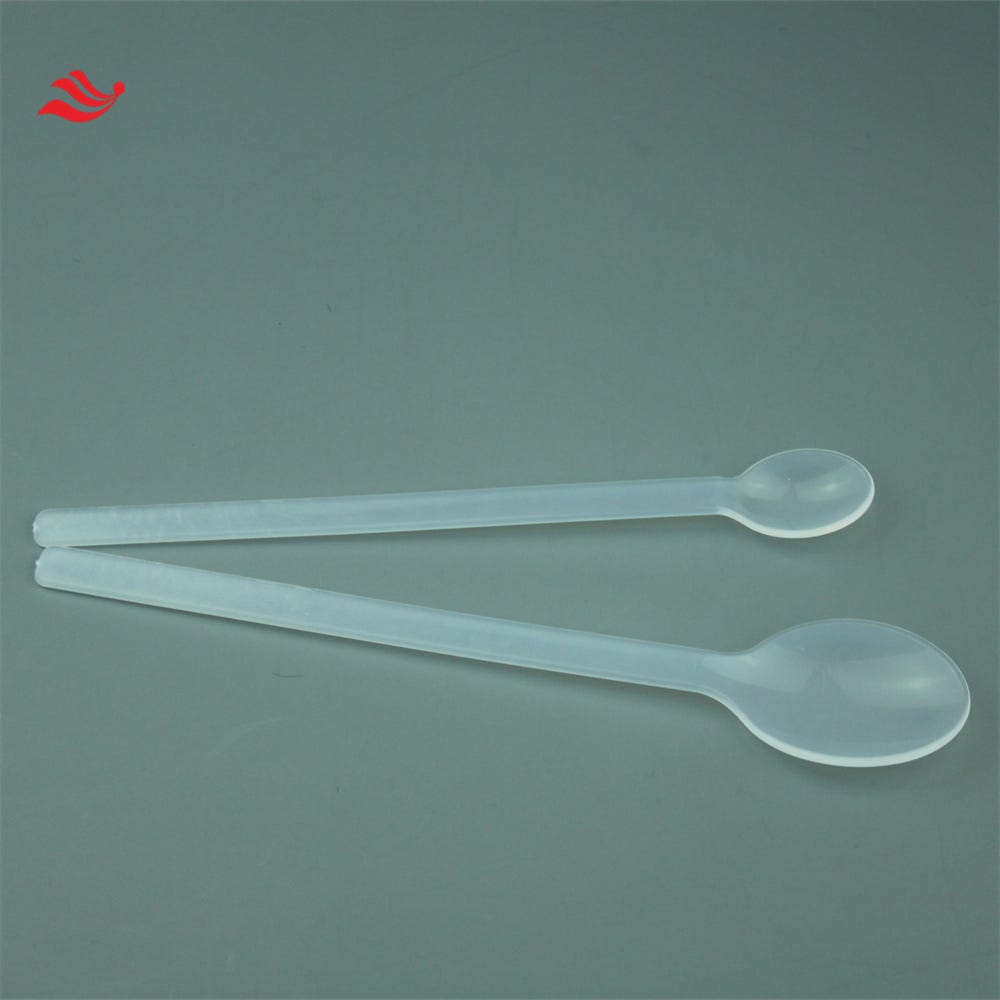 PTFE scoop and tweezer 1. white appearance. 2.chemical resistant . 3
