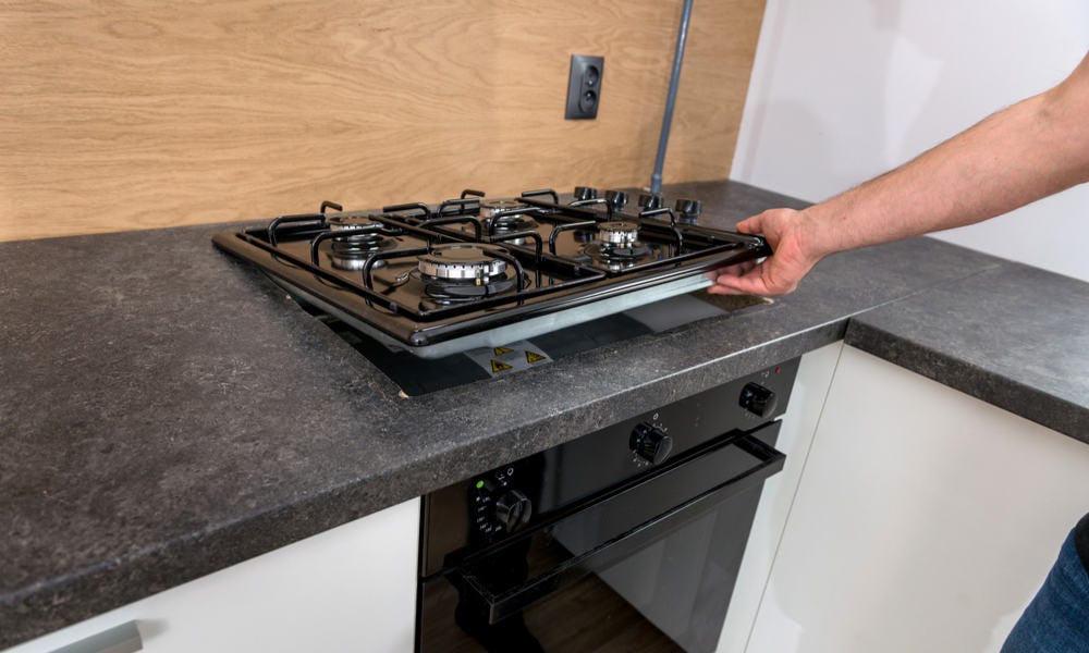 INSTALLING COOKTOP ON GRANITE COUNTERTOP by Maple Grove Kitchen Solutions Medium