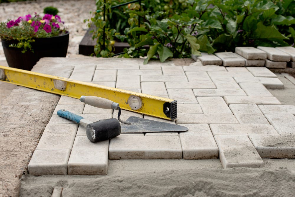 Unlocking The Secrets: How To Lay A Raised Patio With Expert Guidance 