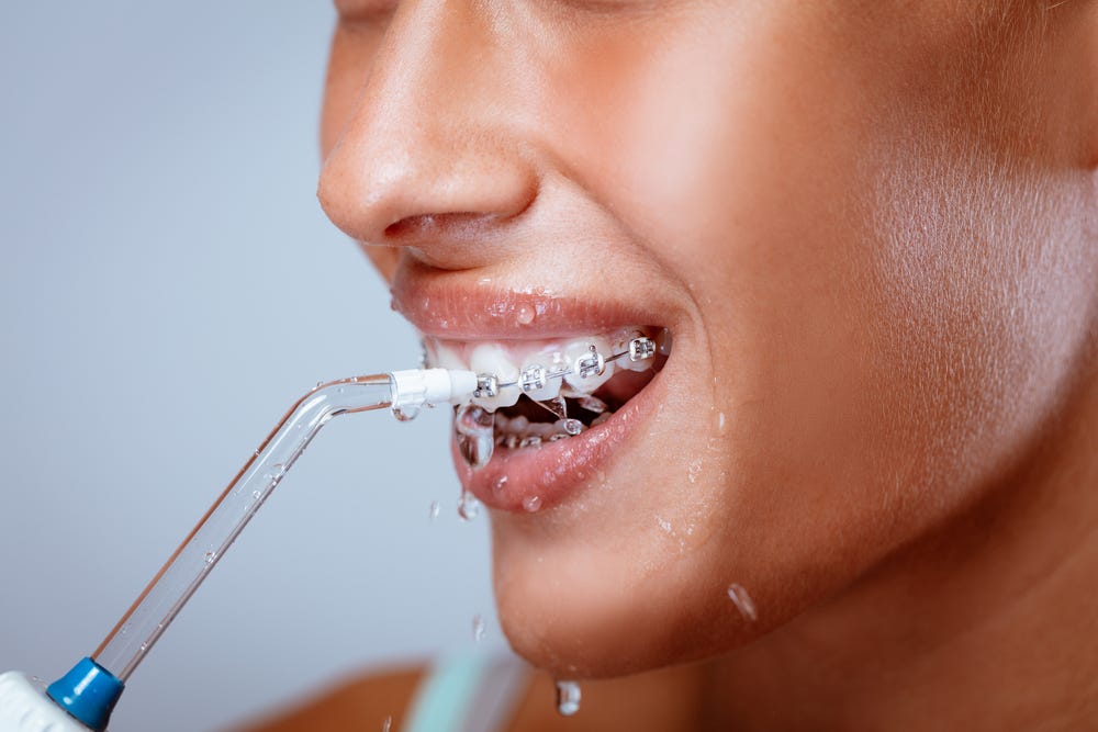 Are water flossers bad for your gums? by yang chun Medium