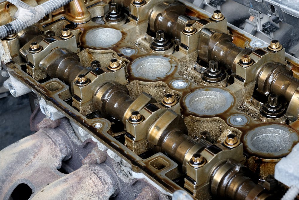 Symptoms Of A BMW Valve Cover Gasket Leak sam Medium