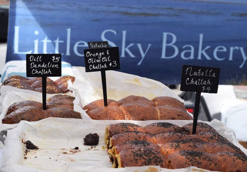 Different flavors of challah for sale at Little Sky Bakery.