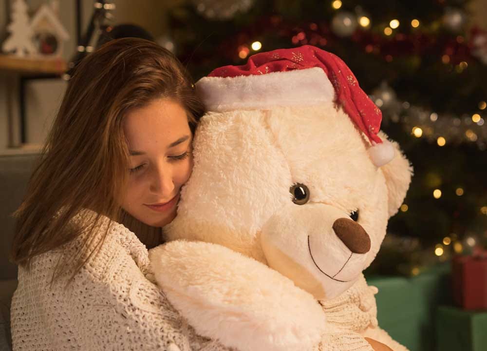 Why Woman Hug teddy bear?. Women embracing teddy bears in…