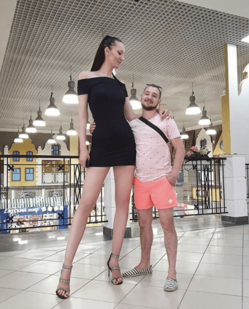 10 Adorable Photos Of Ekaterina Lisina: The Tallest Woman In The World.  Lisina holds two world records [    ] — the record for the lady with the longest legs [ htt 