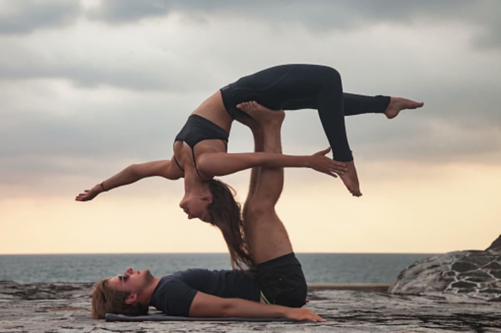 Intro to AcroYoga + 5 Beginner AcroYoga Poses to Try