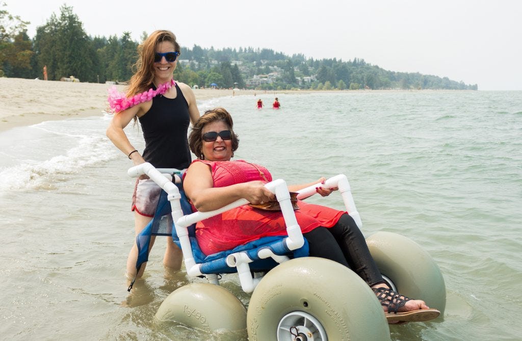 Hitting the Waves in a Beach Wheelchair | by Tabassum Chagani | Medium