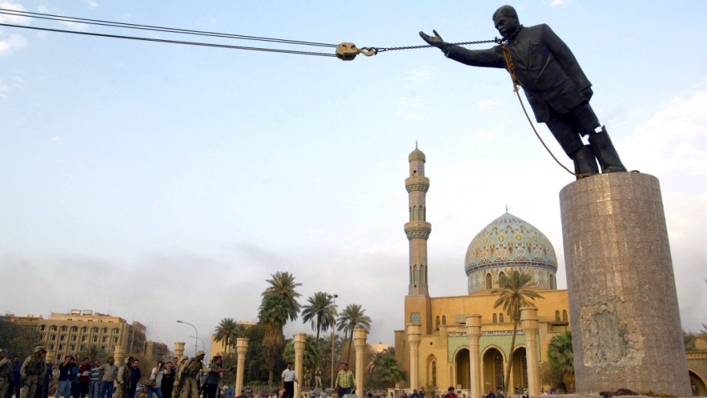 Saddam’s statue being toppled by the American Forces