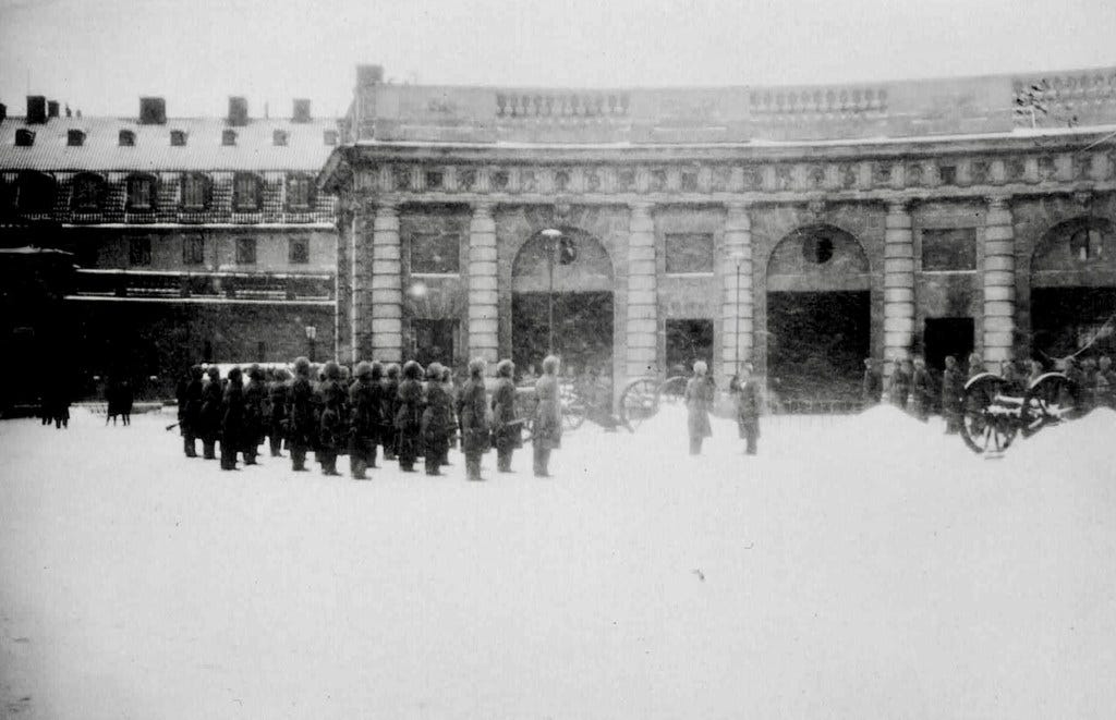 Changing guards at the palace in a snowstorm