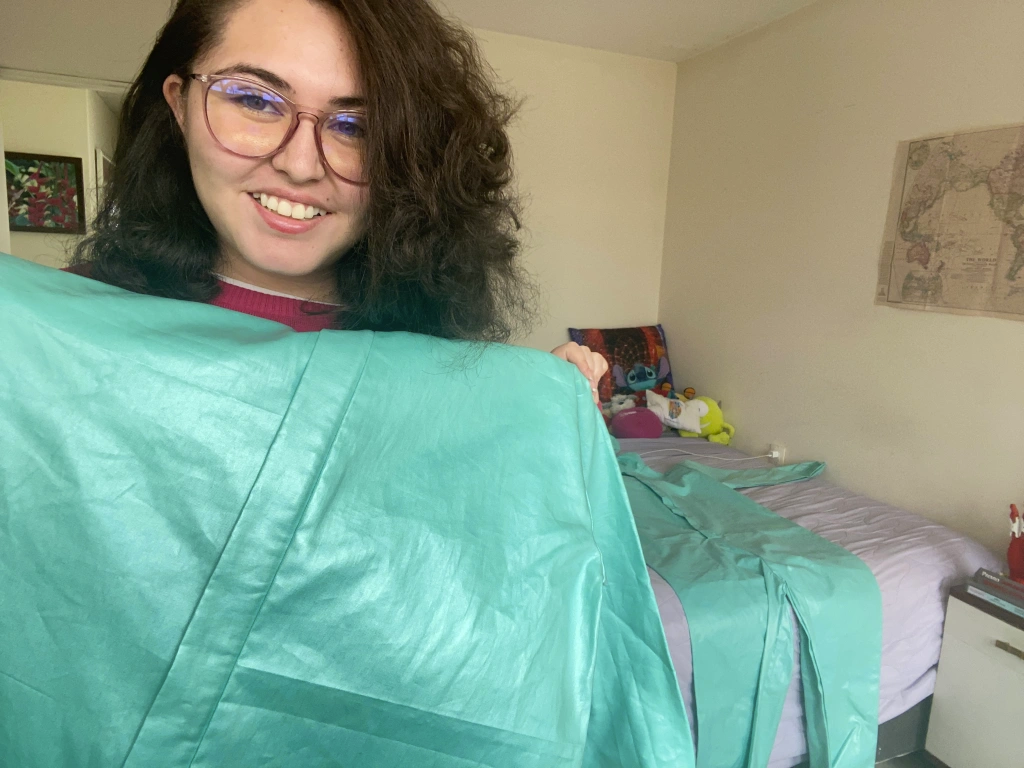 Tamy with an early prototype of her MEDU gown