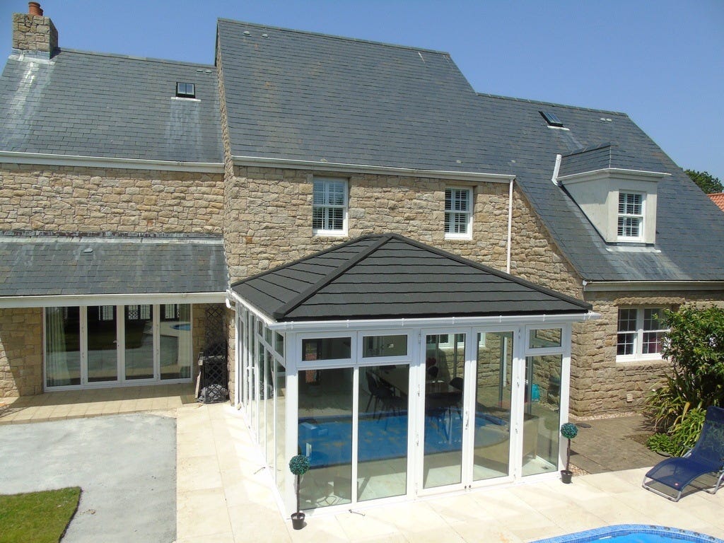 Time to install a Solid Roof Conservatory ready for the summer!? | by