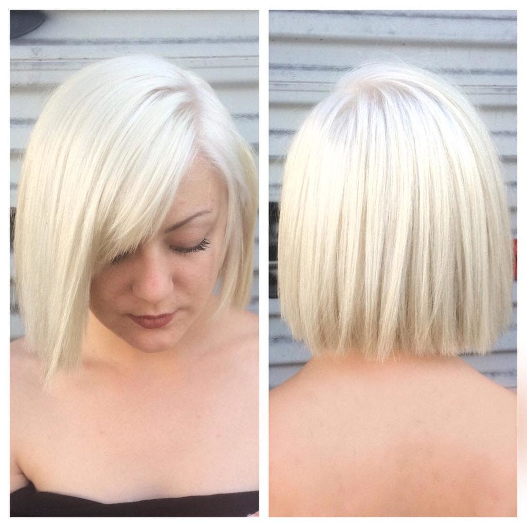 Image of Blunt bob with side swept bangs and textured ends