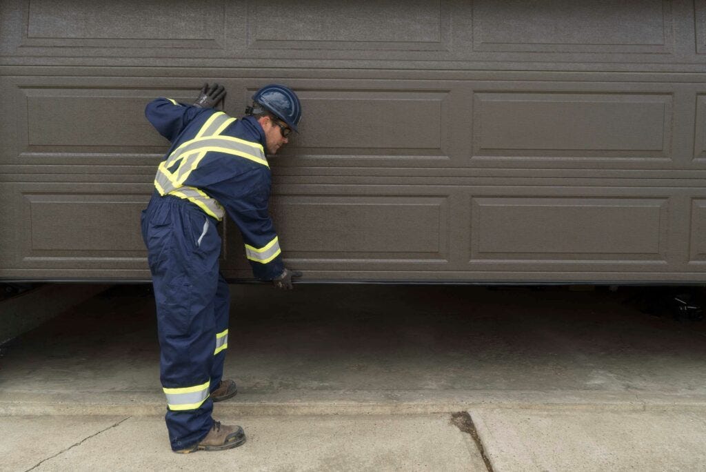 What do garage door installers make? by ASAP Garage Door Service Medium