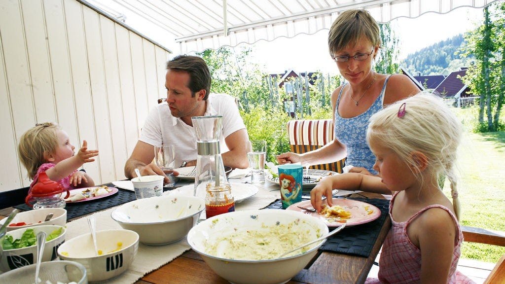 A person happily eating a meal in a foreign country - section 6