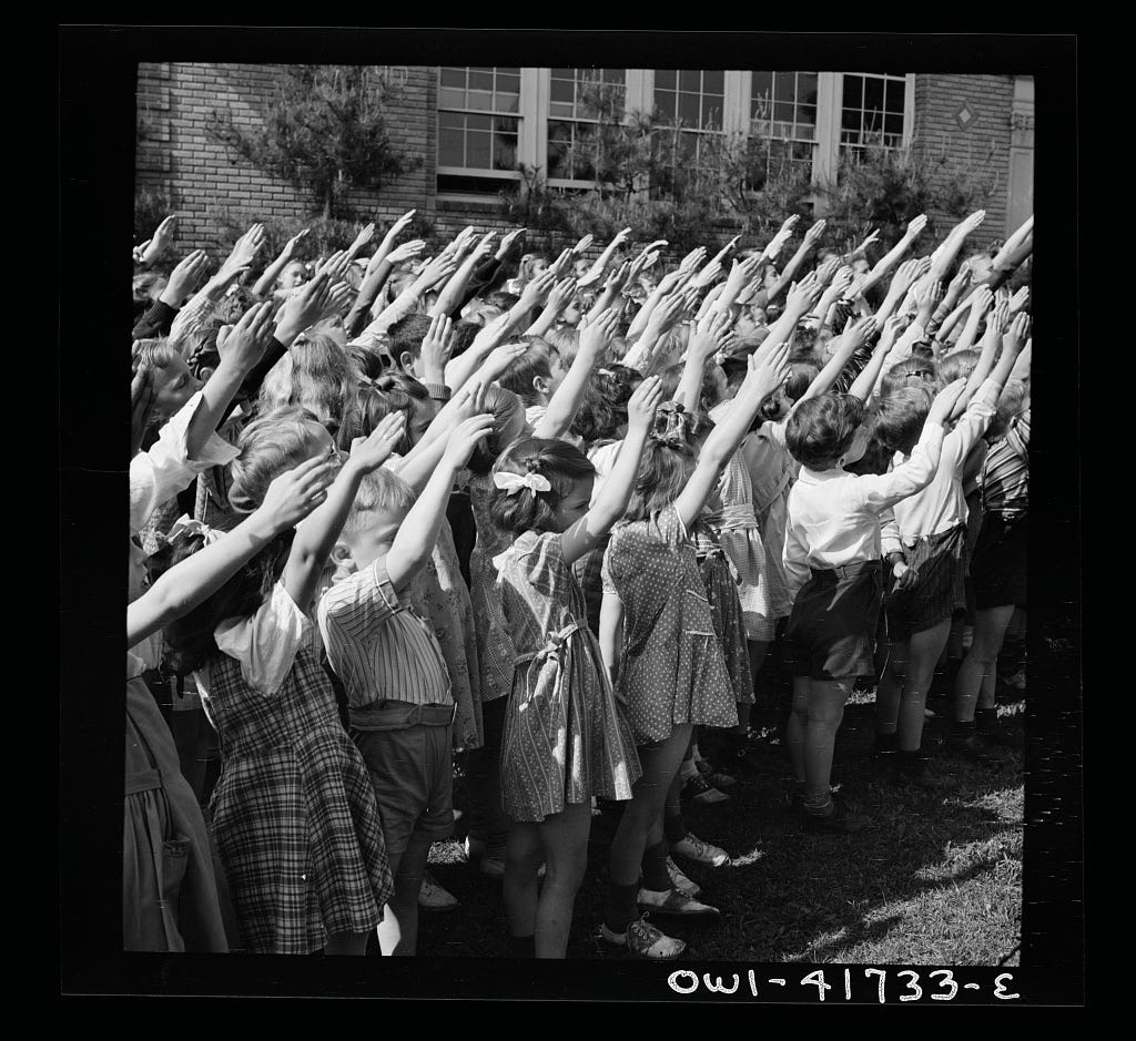 Southington, Connecticut. School children pledging their allegiance to the flag. Look familar? | Public Domain