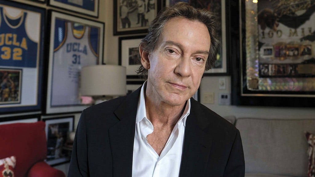 A professional photograph of John Branca representing the successful executors of Michael Jackson's estate.