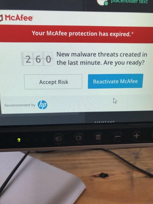 McAfee’s fake malware notification. The notification makes it look like the user has been hacked in order to get them to use their service. Photo by Flavio Lameza.