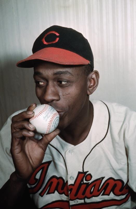 Satchel Paige Pitching For St. Louis by Bettmann