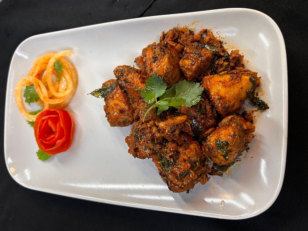 Order Delicious Indian Food on Uber Eats from The Biryani Lounge.