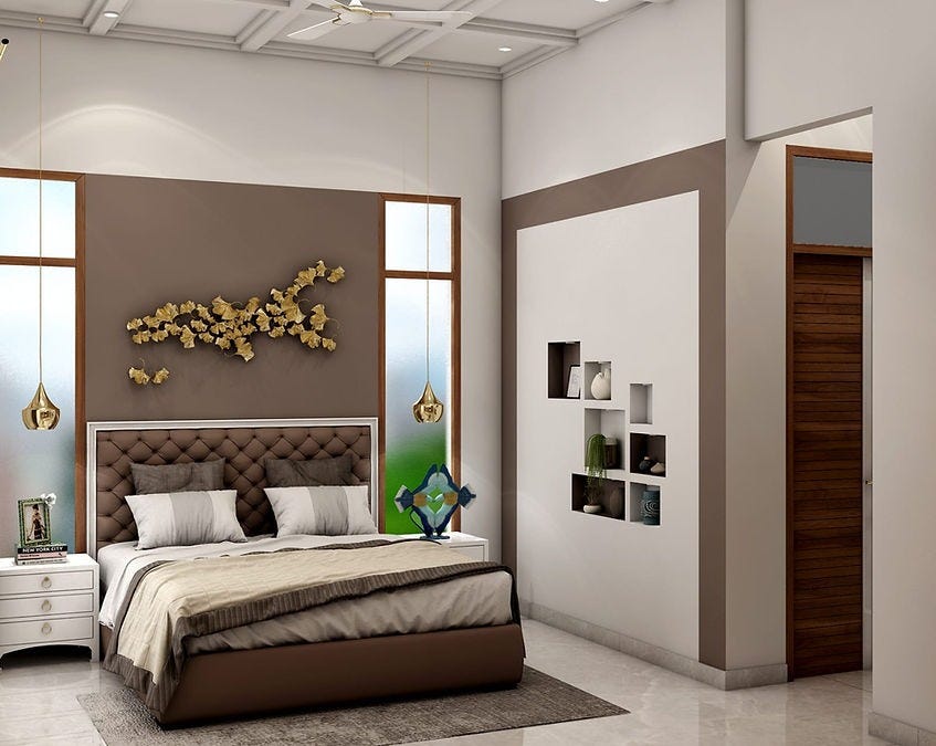Elegant bedroom interior featuring a tufted headboard, pendant lighting, neutral color palette, and decorative wall niches, designed by ArchitectsHive. This space showcases a perfect blend of luxury and simplicity, reflecting the refined standards of interior design in Noida. With attention to detail and spatial harmony, it exemplifies the creative work of interior designers in Noida and represents the excellence delivered by the best interior designers in Noida for serene interior in Noida.