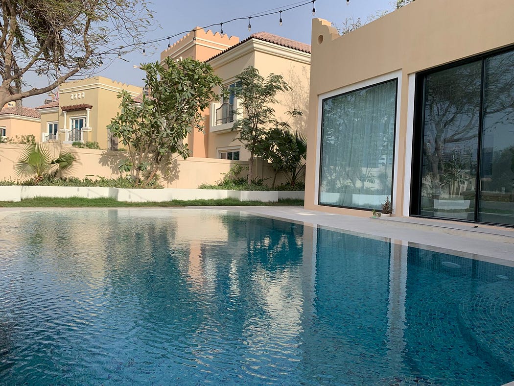 Swimming Pool and Outdoor Living Space by Exterior Space Crafting Natural Luxuries