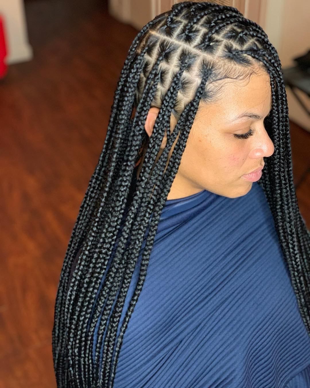 Box Braiding your hair. Box braids are a type of hair-braiding