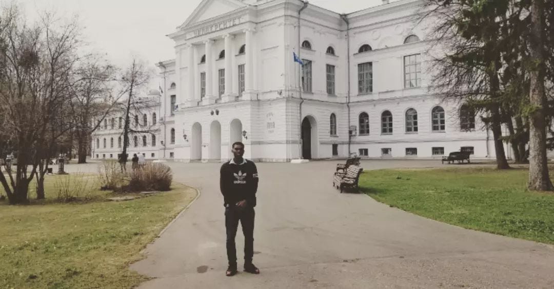 Caleb In front of school