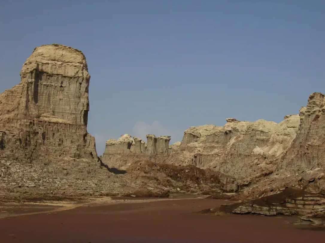 Pillars made of alternating layers of salt and thin films of clay In the Danakil Depression. Source