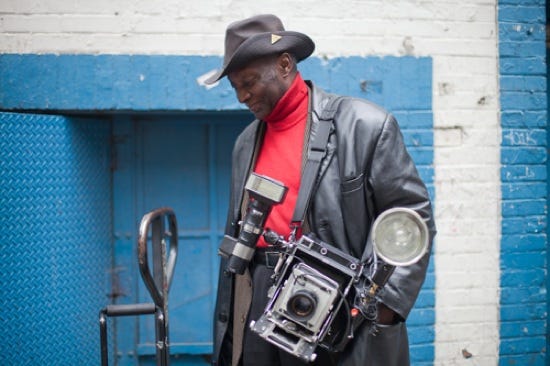 Louis Mendes, a New York City photographer known for carrying
