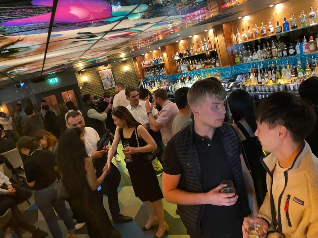 people interacting with each other at a party