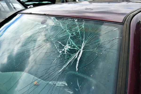 What should be the cause of concern if you have to deal with a broken windshield? (Service My Car)