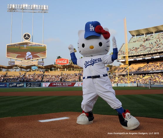 Hello Kitty throws the ceremonial first pitch before a baseball