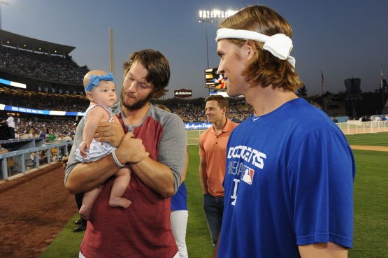 Clayton Kershaw with his wife and their daughter ST 2015