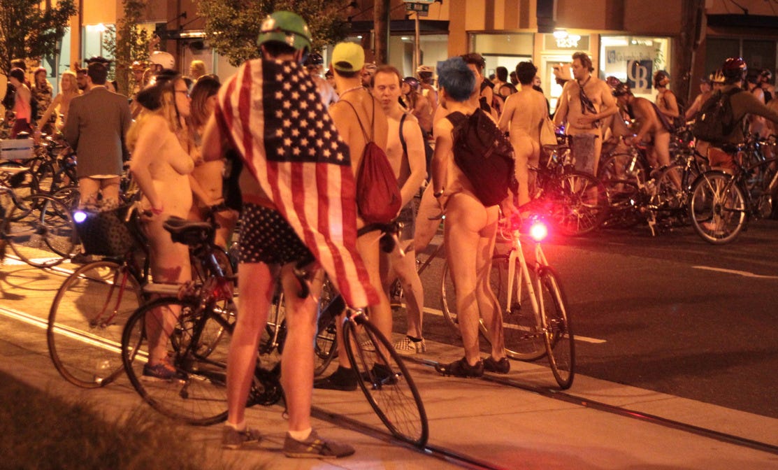 Naked bicyclists gathering ever closer the closer we get to the Museum
