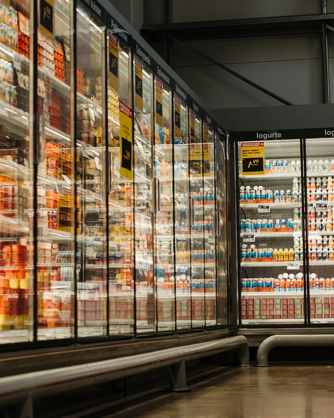 Glass freezers in a grocery store.