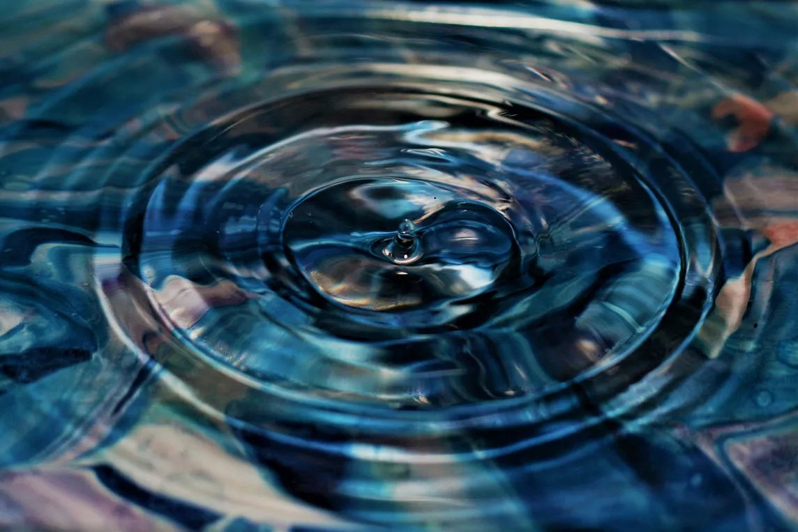 A ripple grows in water