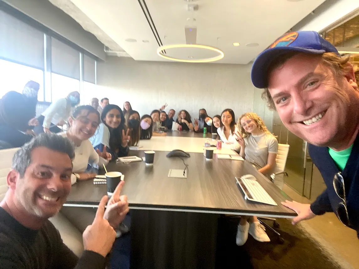 Known Studios presidents Mark Feldstein and Brad Roth pose with USC Annenberg students during a visit to Known’s Los Angeles office.