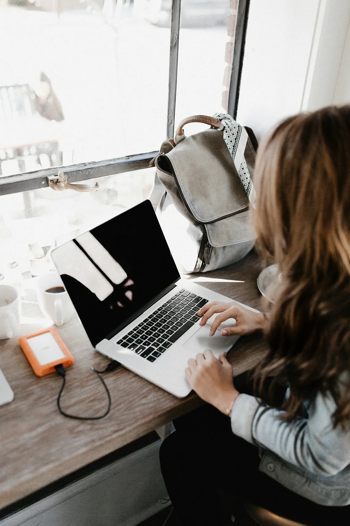 woman working on laptop