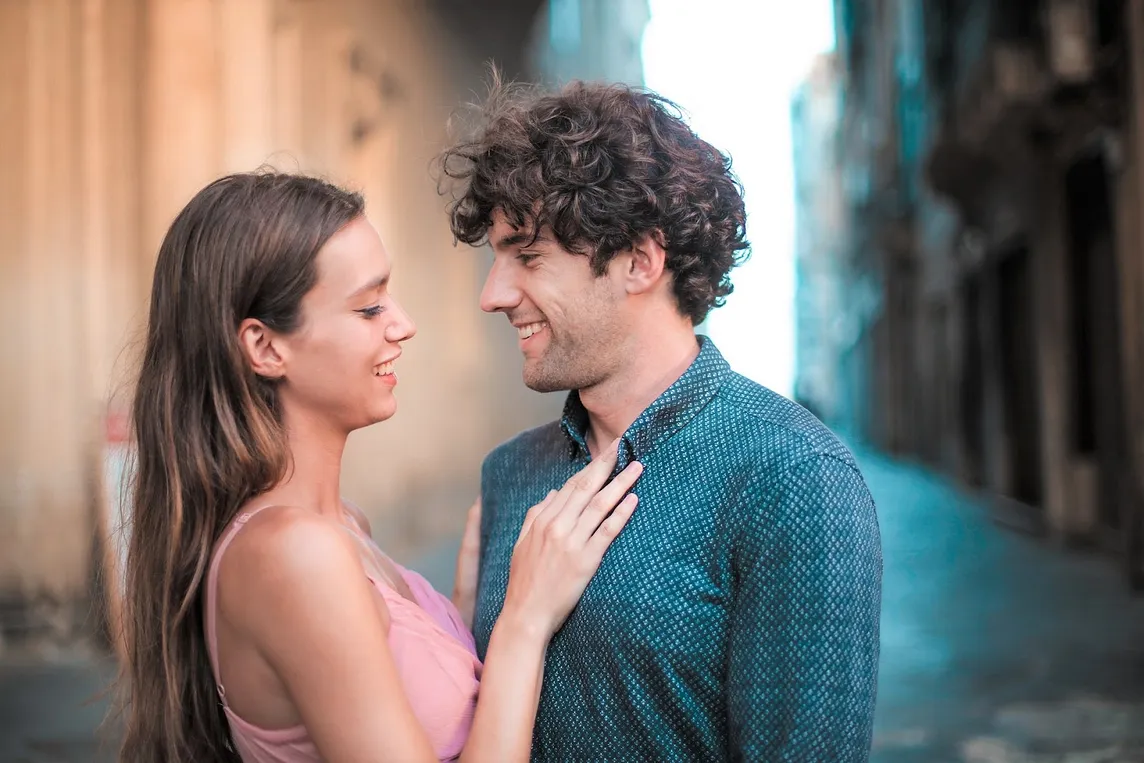 A woman looking at a man.