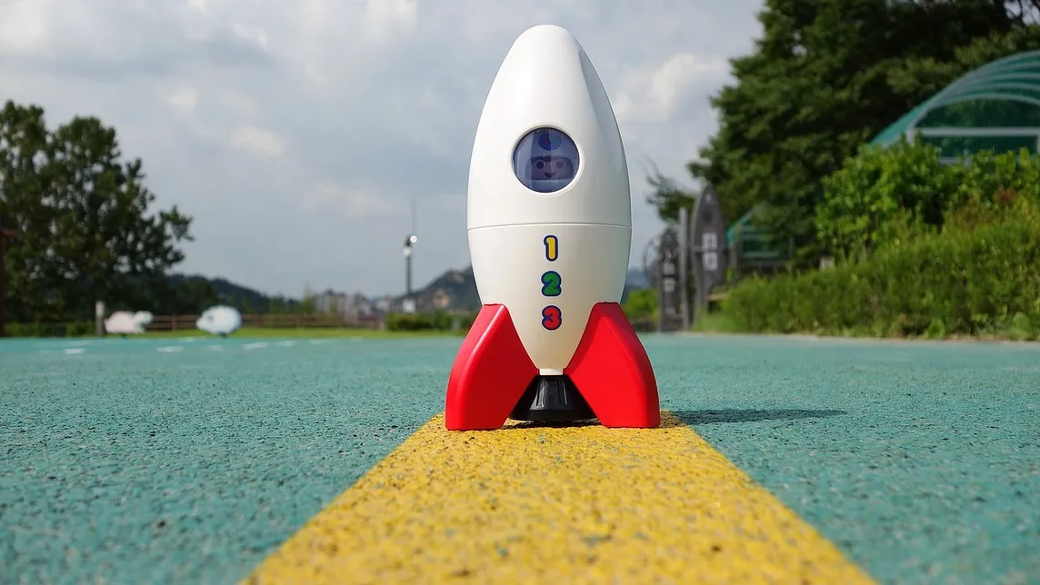 Toy rocket on launch pad.