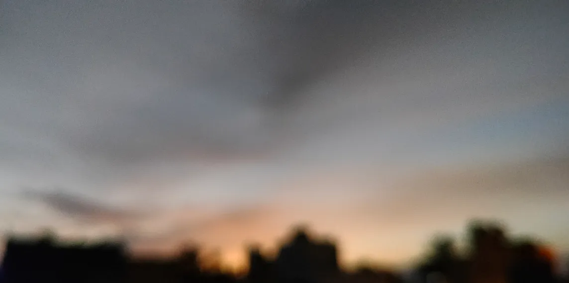 blurred skies and city lights