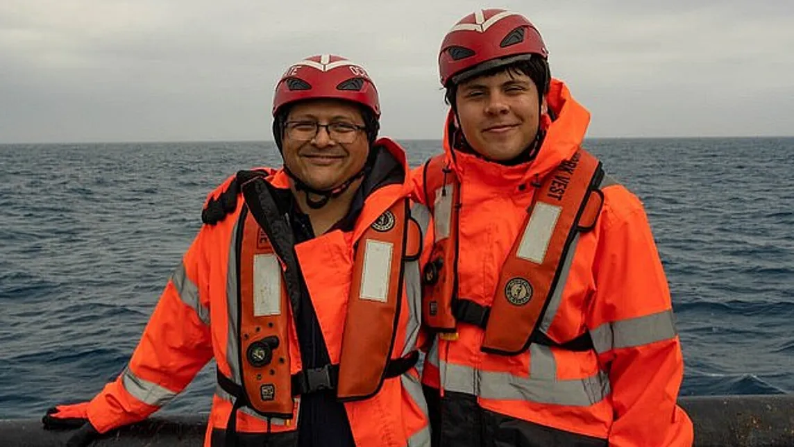 Shahzada Dawood, left, and son Suleman. Mr. Dawood’s wife, Christine, said her husband couldn’t contain his enthusiasm about the trip to the Titanic, saying, “I’m diving tomorrow! I’m diving tomorrow!” Credit…Oceangate, via Abbi Jackson