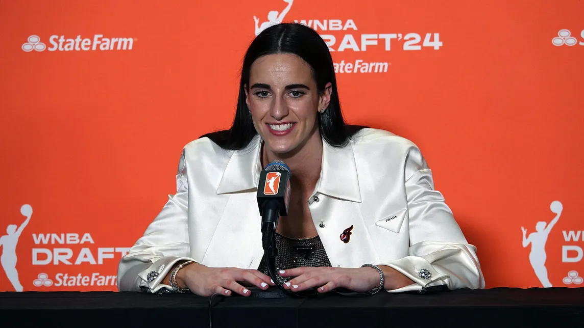 Caitlin Clark answers media questions after being drafted during the 2024 WNBA Draft.