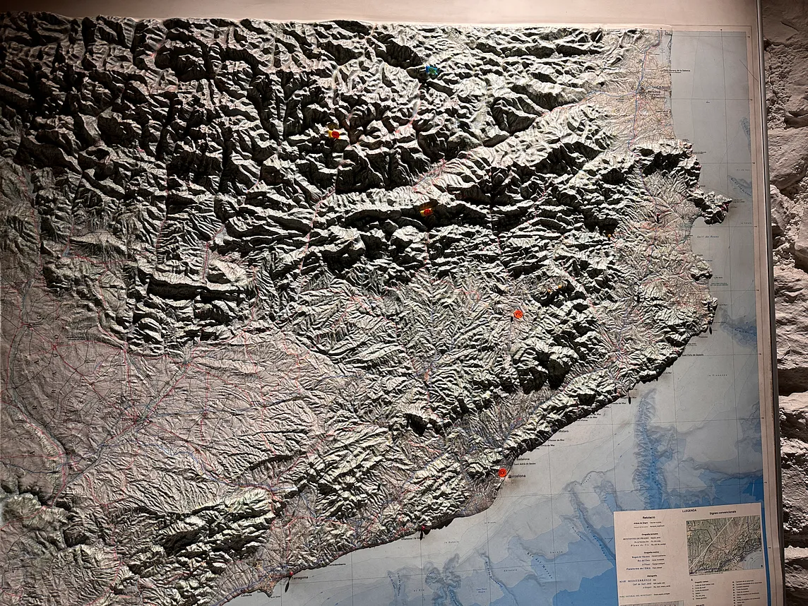 Topical photo of a map on a wall.