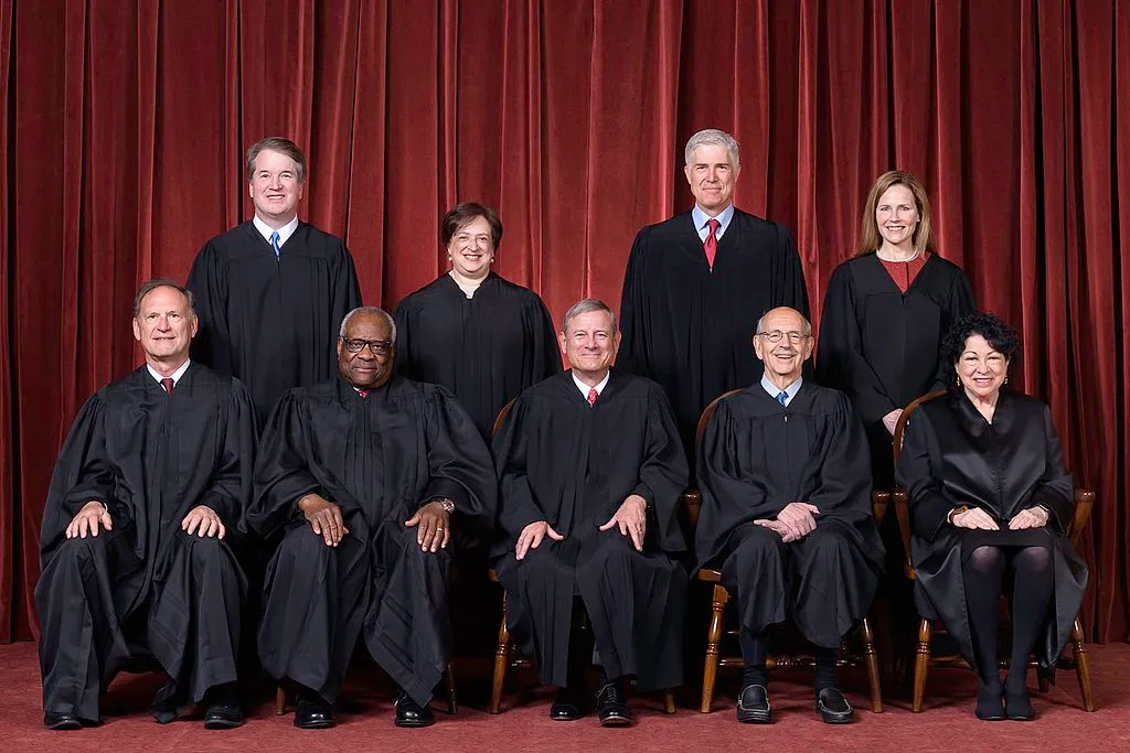 Group photo of nine U.S. Supreme Court justices in robes.