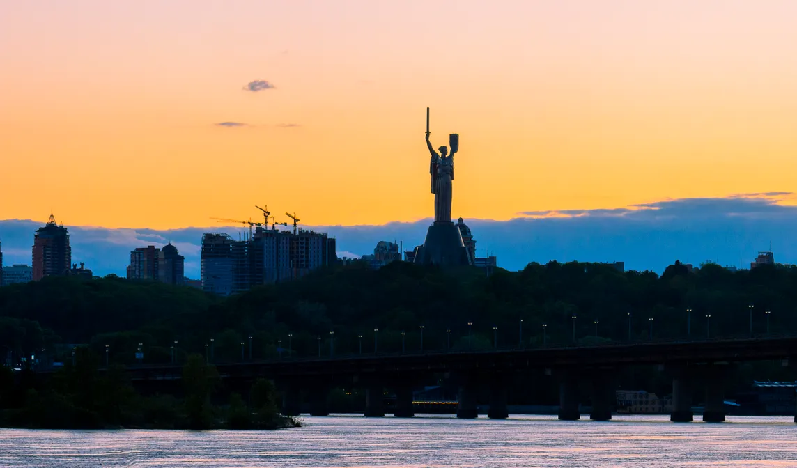 The monument called Mother Ukraine stands watch over the skyline of Kyiv, Ukraine. Photo by Artem Hvozdkov/Getty Images