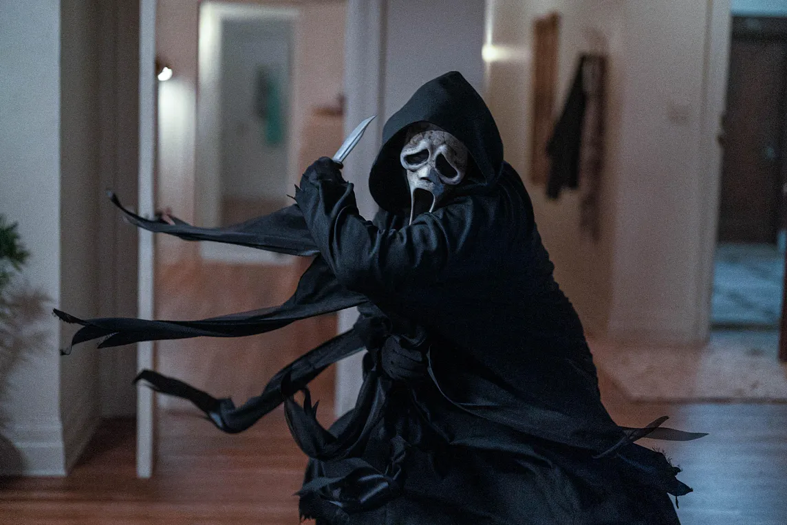 Photo of Ghostface wielding a knife in Scream VI, released in 2023.